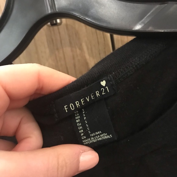 Tight black tank top with a small turtle neck - Picture 2 of 3